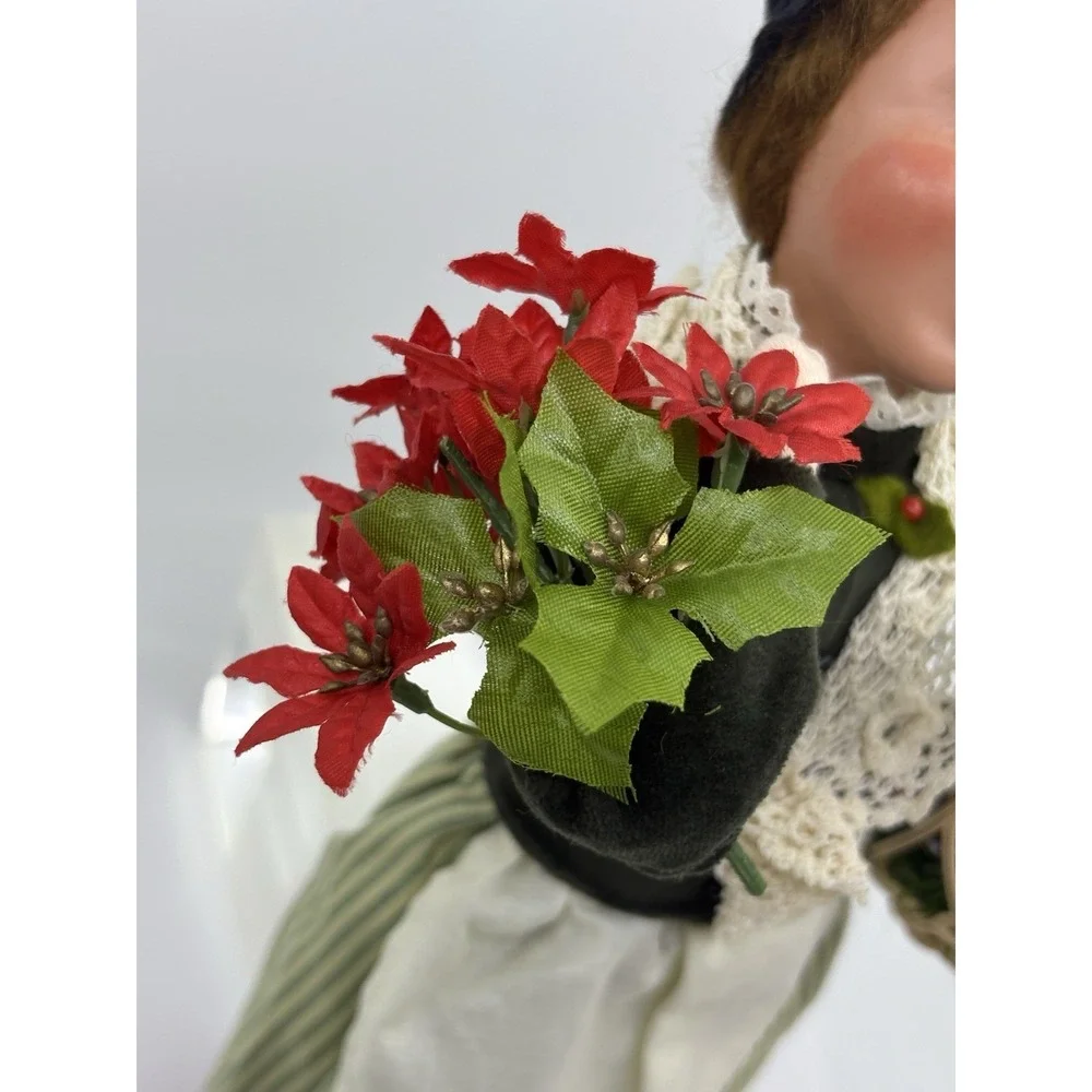 2009 Woman Selling Holiday Flowers By Buyers choice The Carolers